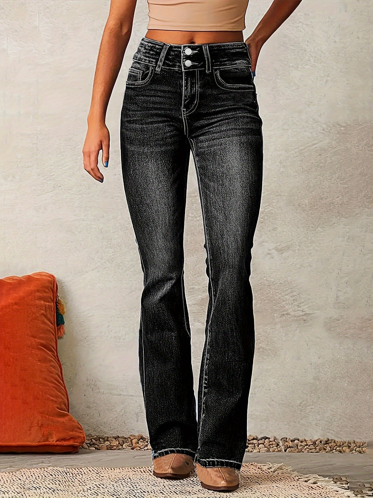 Womens flare jeans in Black with double button high waist, front view
