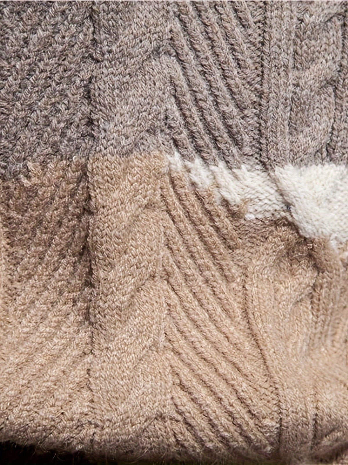 Mens cable knit sweater in Cream, close-up of the cables and stripes