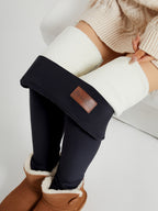 Womens fleece lined leggings in Black, folded down to show the plush lining