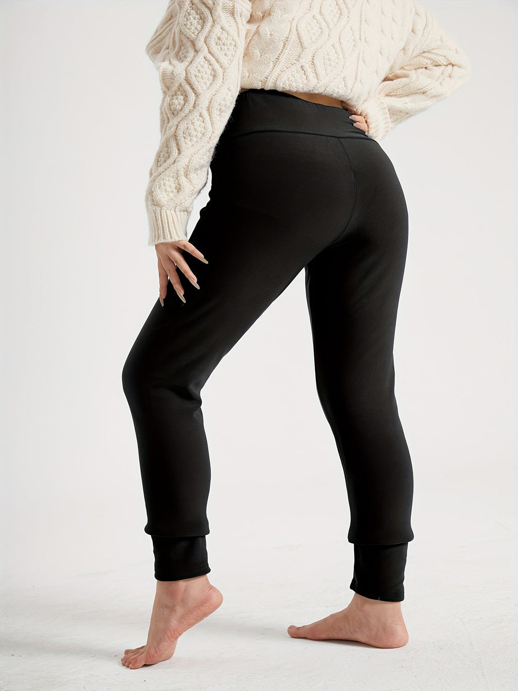 Womens fleece lined leggings in Black, full length back view