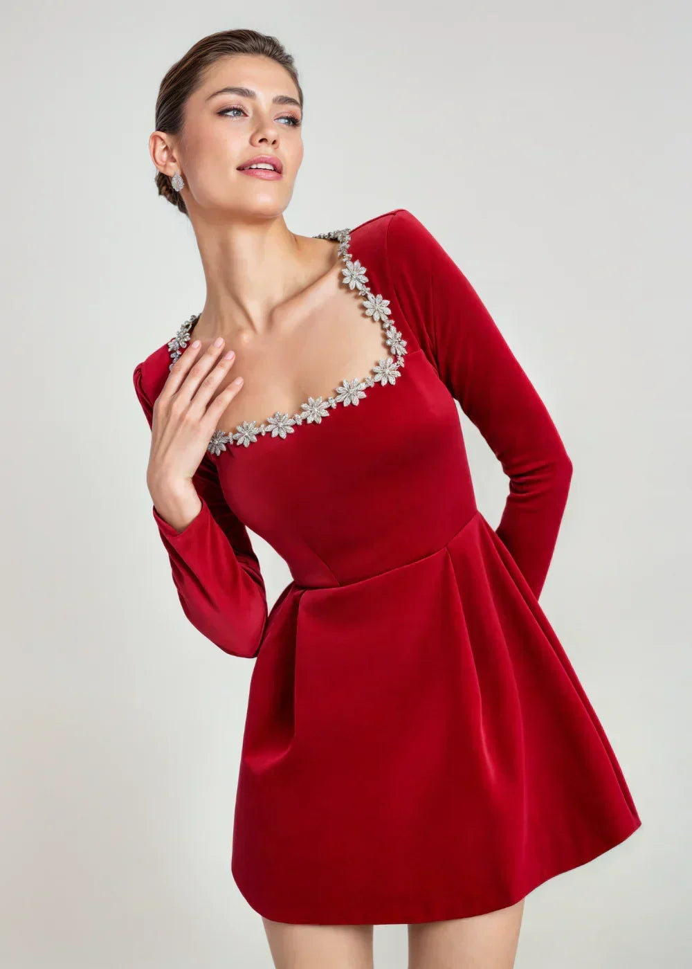 Womens velvet mini dress in Red, close view of the rhinestone square neckline