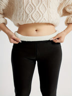 Womens fleece lined leggings in Black, high waist folded to show the plush lining