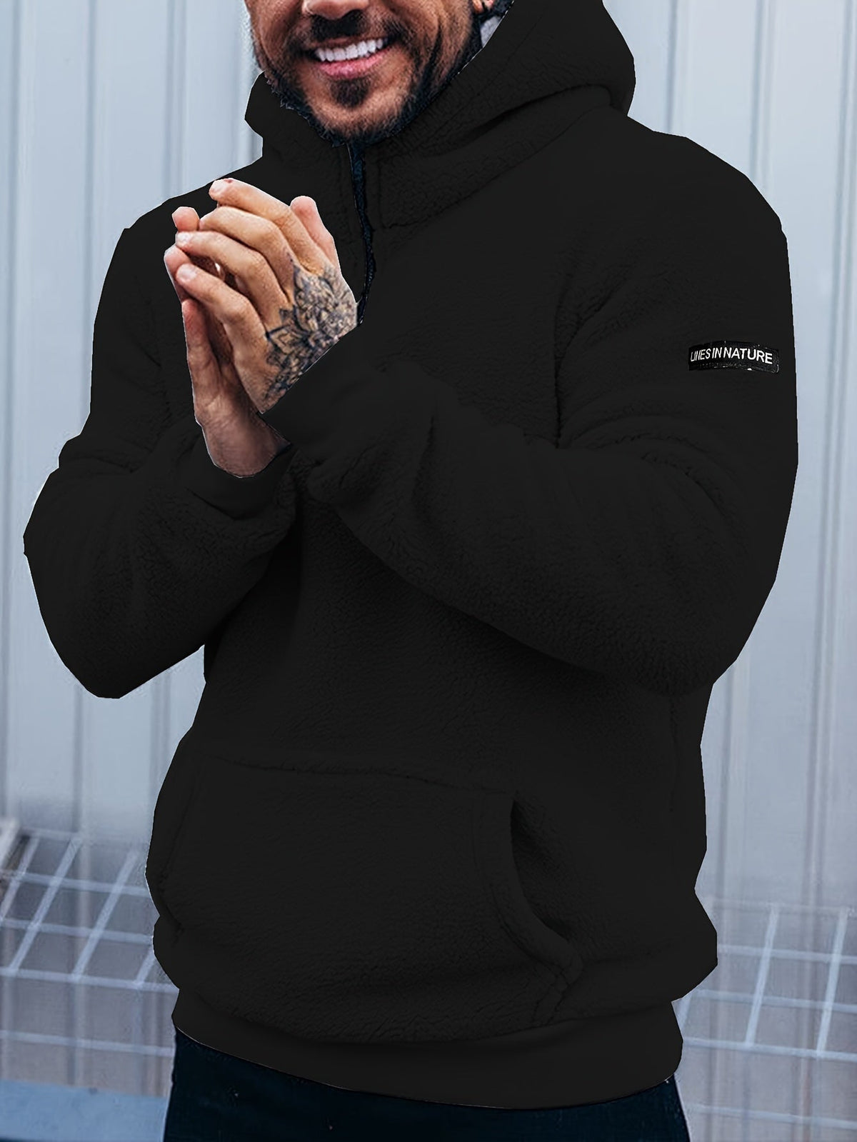 Mens sherpa hoodie in Black, front view on a model