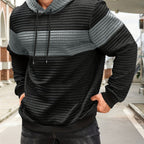 Mens hoodie in Gray with black body and chest stripe, worn