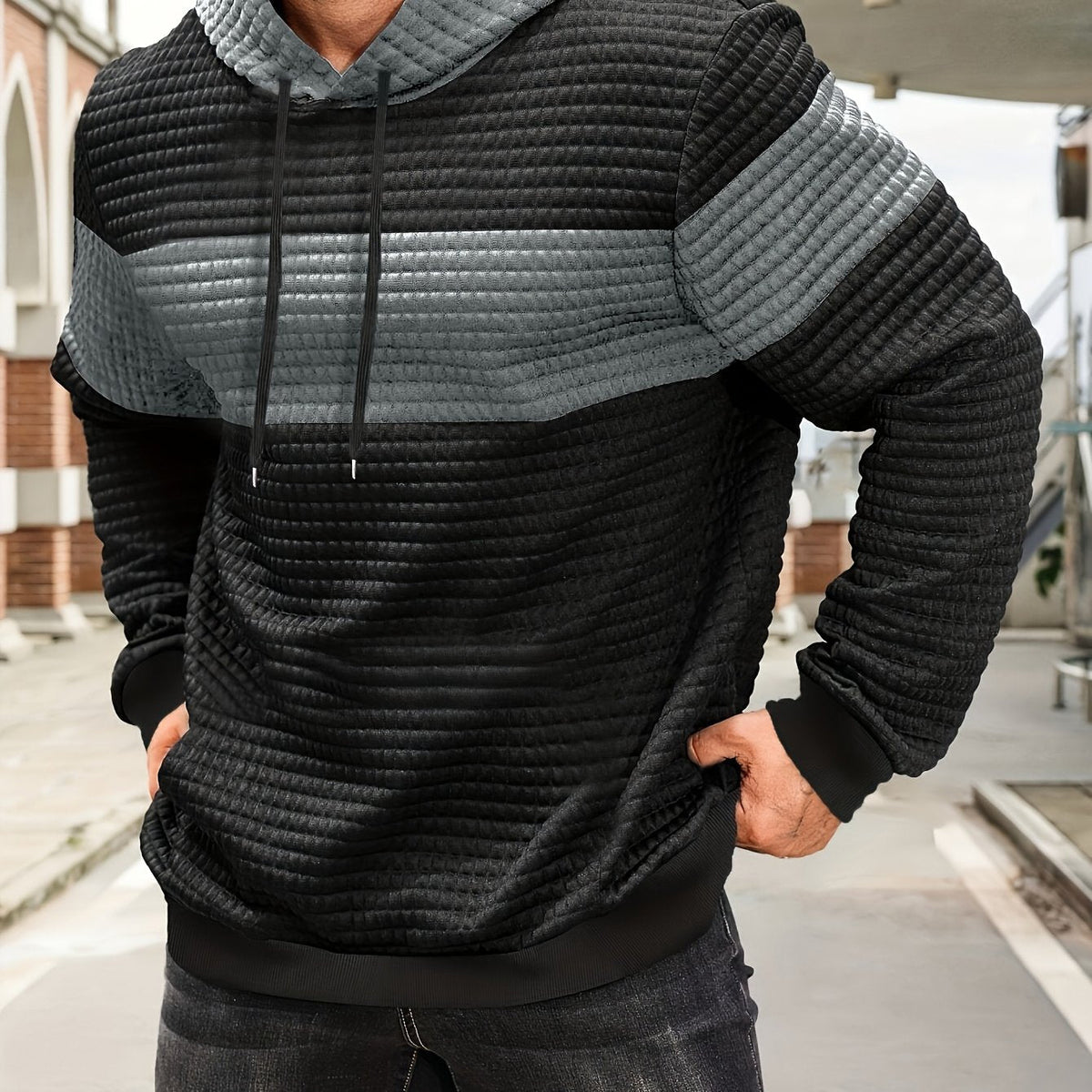 Mens hoodie in Gray with black body and chest stripe, worn