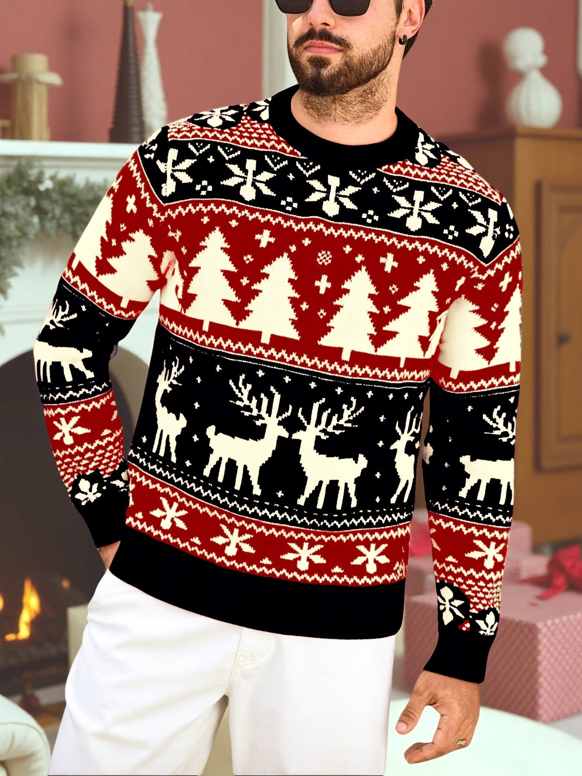 Mens Christmas sweater in Black with reindeer and tree pattern, worn