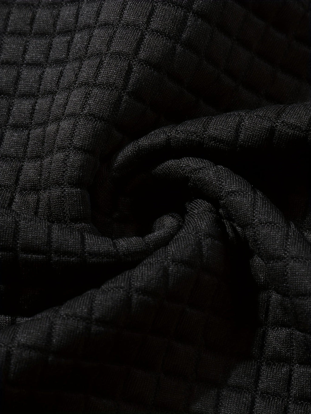 Mens hoodie, close-up of the black waffle knit body