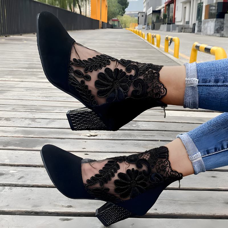 Womens lace booties with block heel in Black, worn, side view