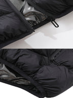 Mens heated jacket in Black, close-up of the zip hand pockets