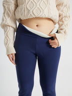 Womens fleece lined leggings in Navy, high waist folded to show the plush lining