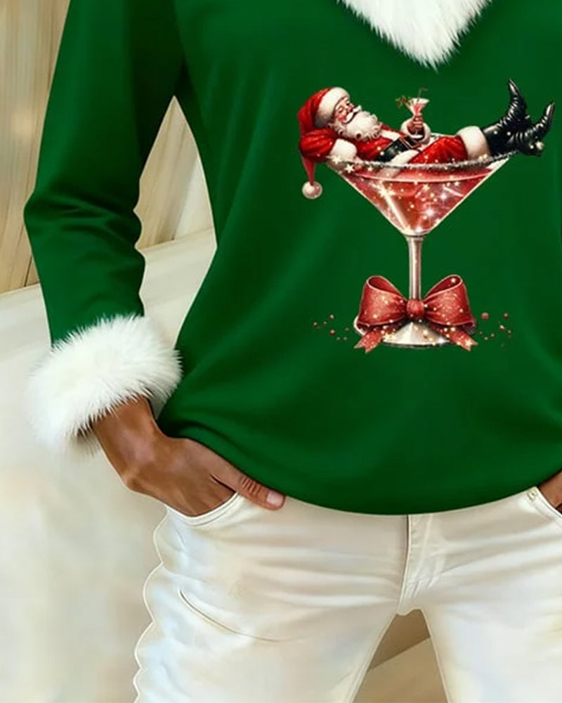 Womens Christmas sweater in Green, close view of the graphic and cuff