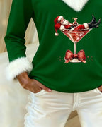 Womens Christmas sweater in Green, close view of the graphic and cuff