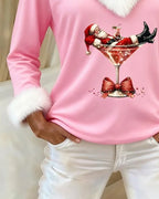 Womens Christmas sweater in Pink, close view of the graphic and cuff