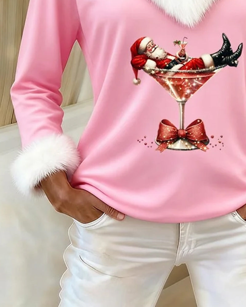 Womens Christmas sweater in Pink, close view of the graphic and cuff