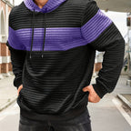 Mens hoodie in Purple with black body and purple chest stripe, worn