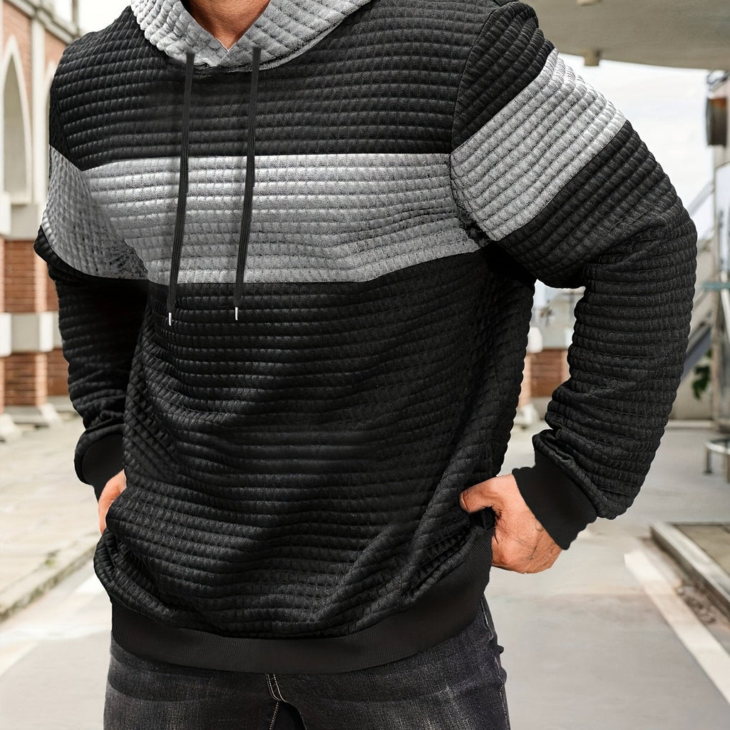 Mens hoodie in Light Gray with black body and chest stripe, worn