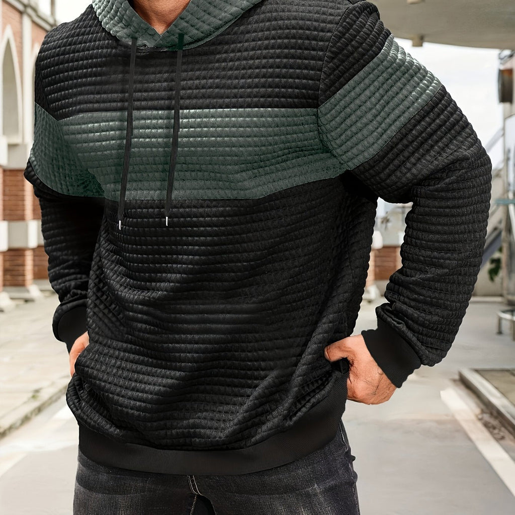Mens hoodie in Charcoal with black body and chest stripe, worn