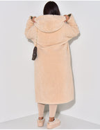 Womens long sherpa coat, back view on model with the hood up