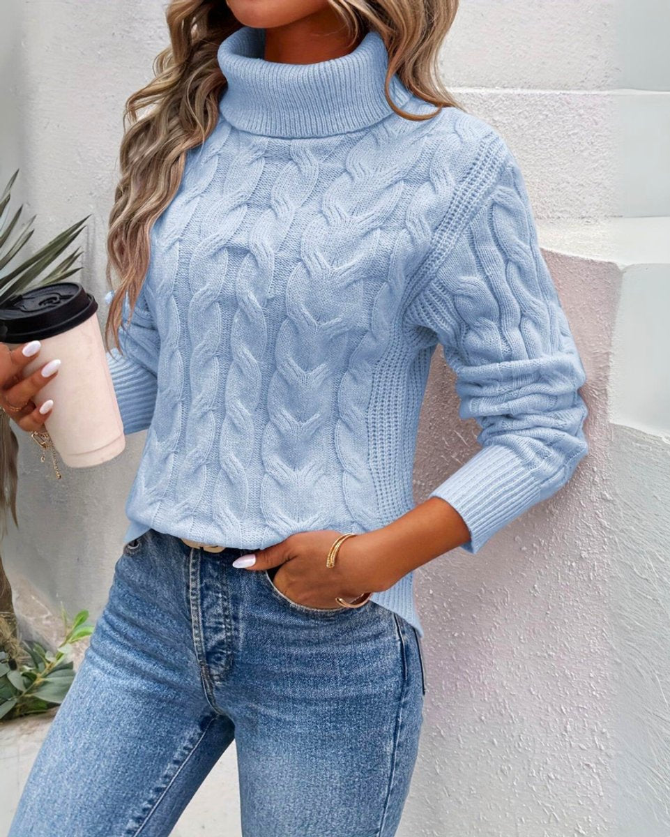 Womens cable knit sweater in Blue with turtleneck, worn with jeans