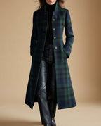 Womens wool blend coat in Green plaid, worn open over a black turtleneck