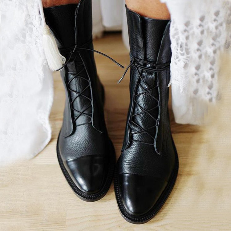 Womens lace up boots in Black with low flat heel, front view