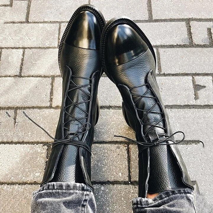 Womens lace up boots in Black worn with gray jeans