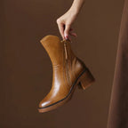Womens ankle boots with block heel in Brown, held up, side zip view