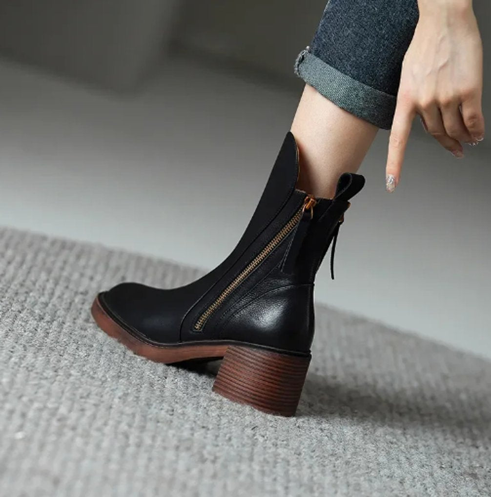 Womens ankle boots with block heel in Black, worn, side zip view
