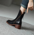 Womens ankle boots with block heel in Black, worn, side zip view