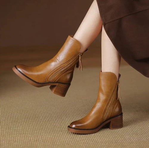 Womens ankle boots with block heel in Brown, worn, side view