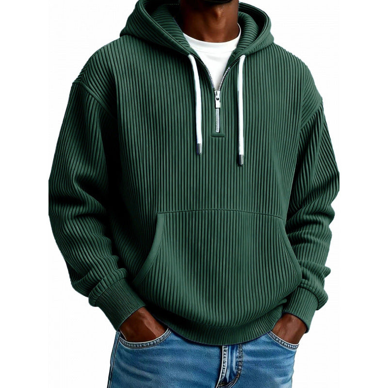 Mens quarter zip hoodie in Green, front view worn with jeans
