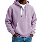 Mens quarter zip hoodie in Purple, front view worn with jeans