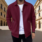 Mens zip up jacket in Burgundy textured knit with zip pockets, worn outdoors