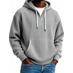 Mens quarter zip hoodie in Gray, front view worn with jeans