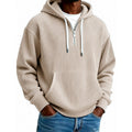Mens quarter zip hoodie in Khaki, front view worn with jeans