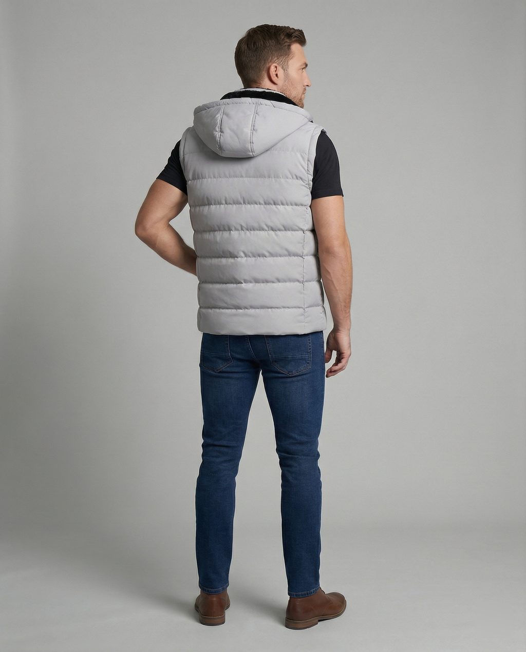 Mens puffer vest with hood in Gray, back view with hood up behind