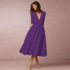 Womens A line midi dress with deep V neck in Purple, front view