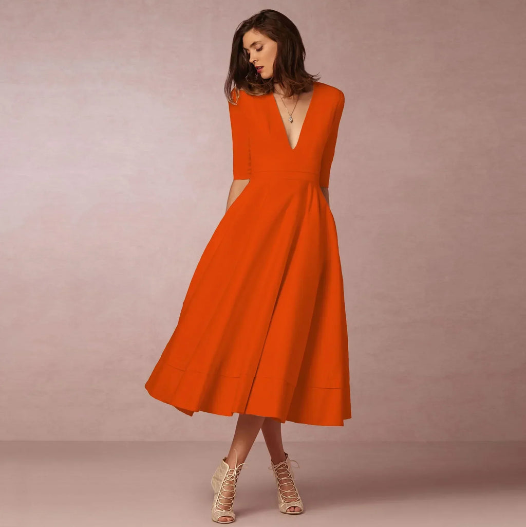 Womens A line midi dress with deep V neck in Orange, front view