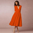 Womens A line midi dress with deep V neck in Orange, front view