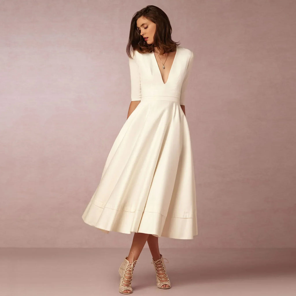 Womens A line midi dress with deep V neck in White, front view