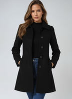 Womens A-line coat in Black, front view with hands in pockets