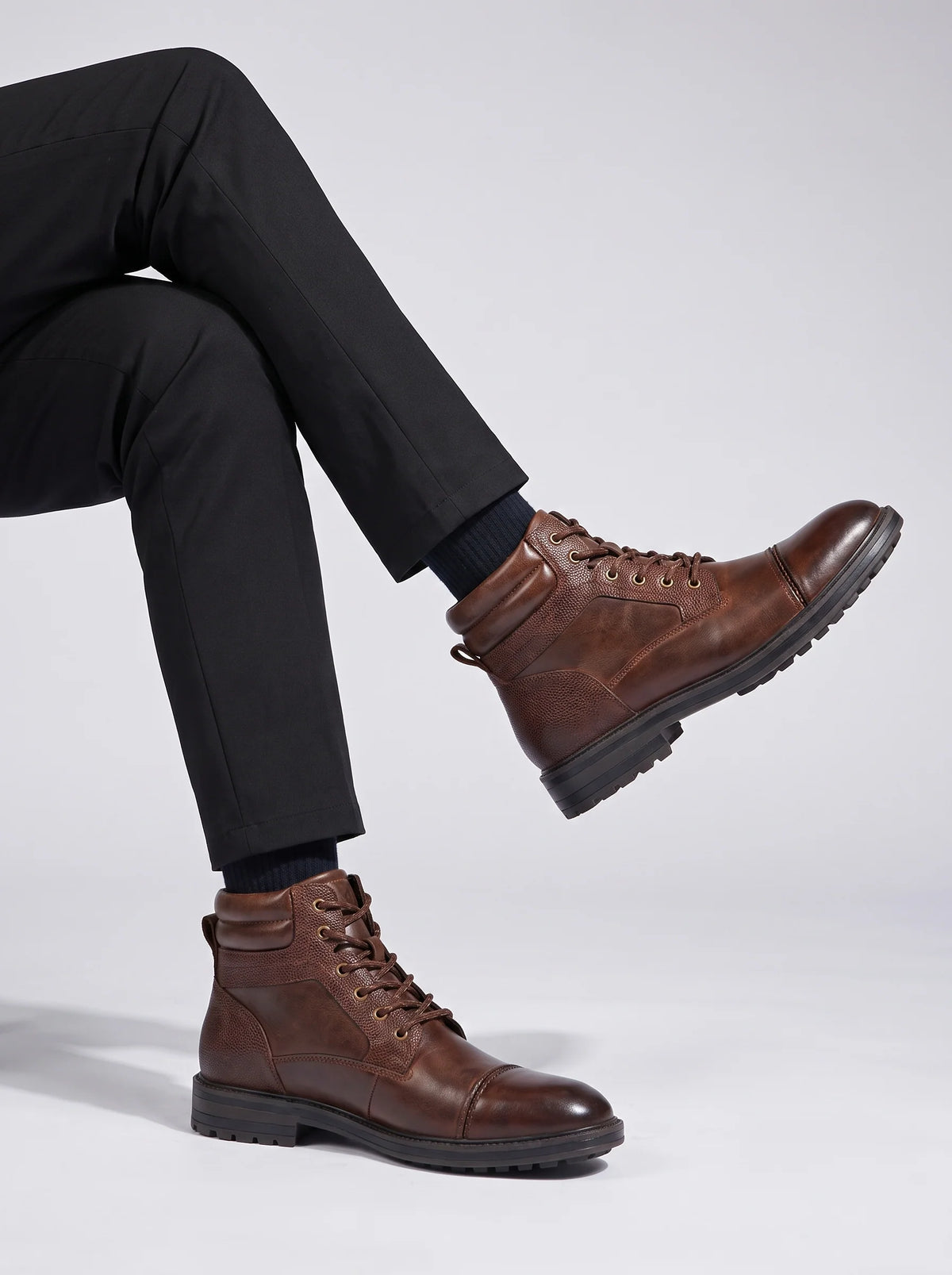 Mens work boots in Brown, worn with black pants