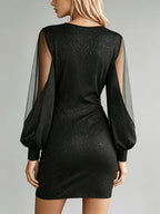 Womens mini dress in Black, back view with mesh sleeves