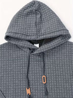 Mens waffle knit hoodie in Charcoal, close-up of the hood and cords