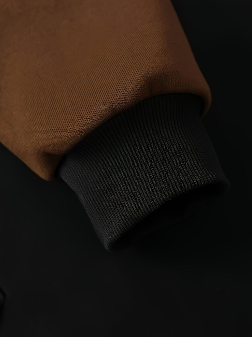 Mens zip up hoodie in Brown, close-up of the sleeve and black ribbed cuff