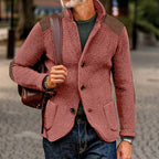 Mens cardigan with stand collar and shoulder patches, shown in dusty pink