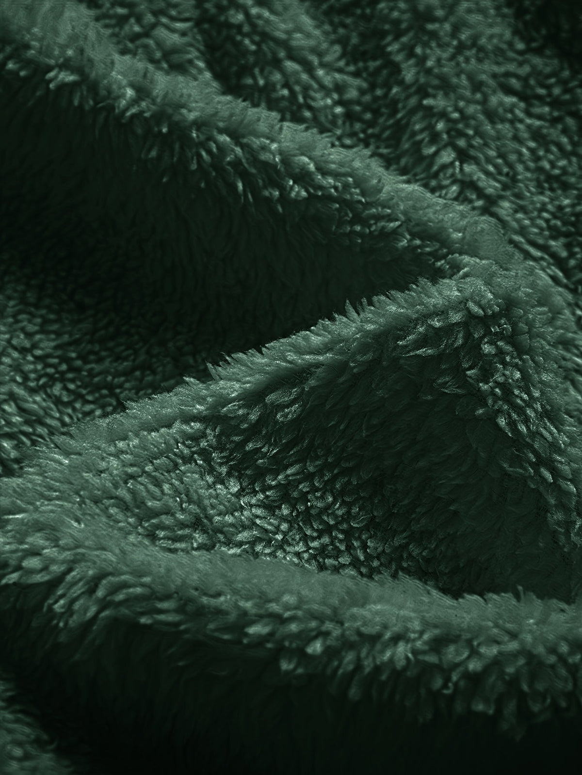 Mens sherpa fleece tracksuit in Navy, close-up of the green sherpa pile