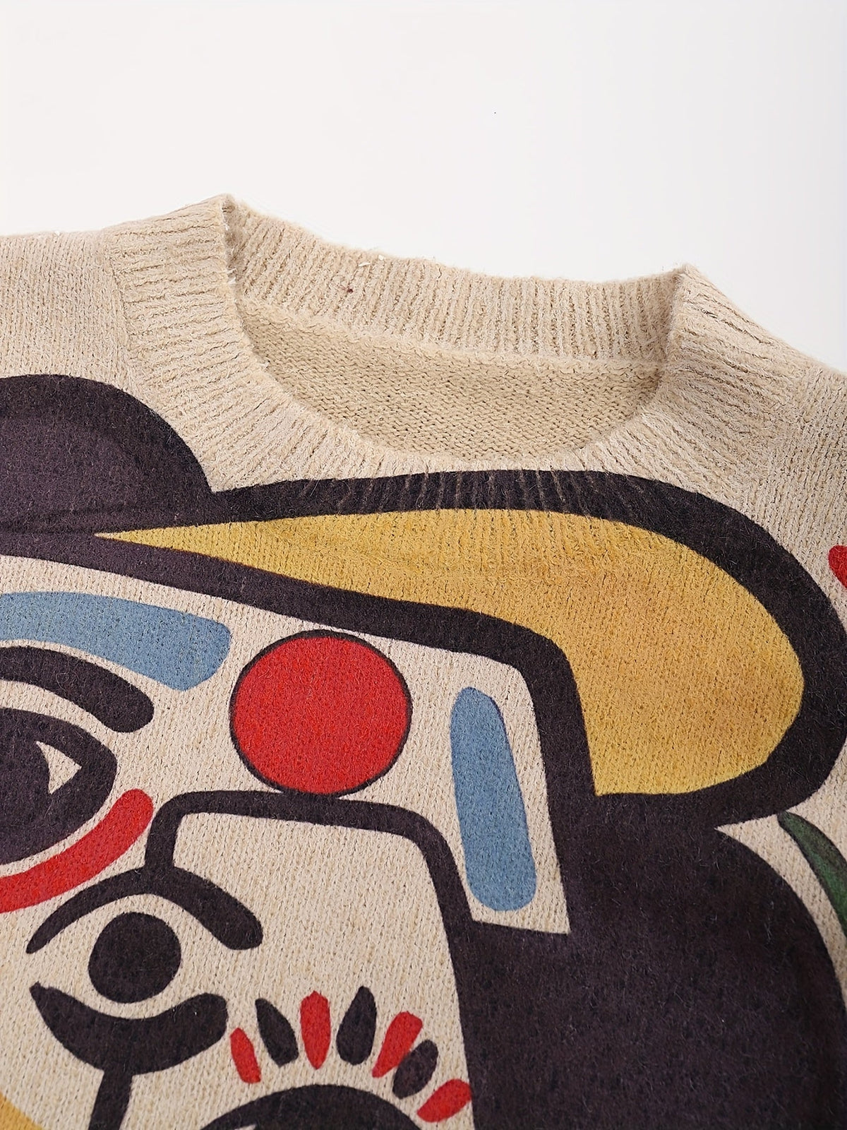 Mens crew neck sweater with abstract face print in Multicolor, close-up of the crew neck and print