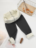 Womens fleece lined leggings in Dark Gray, laid flat inside out