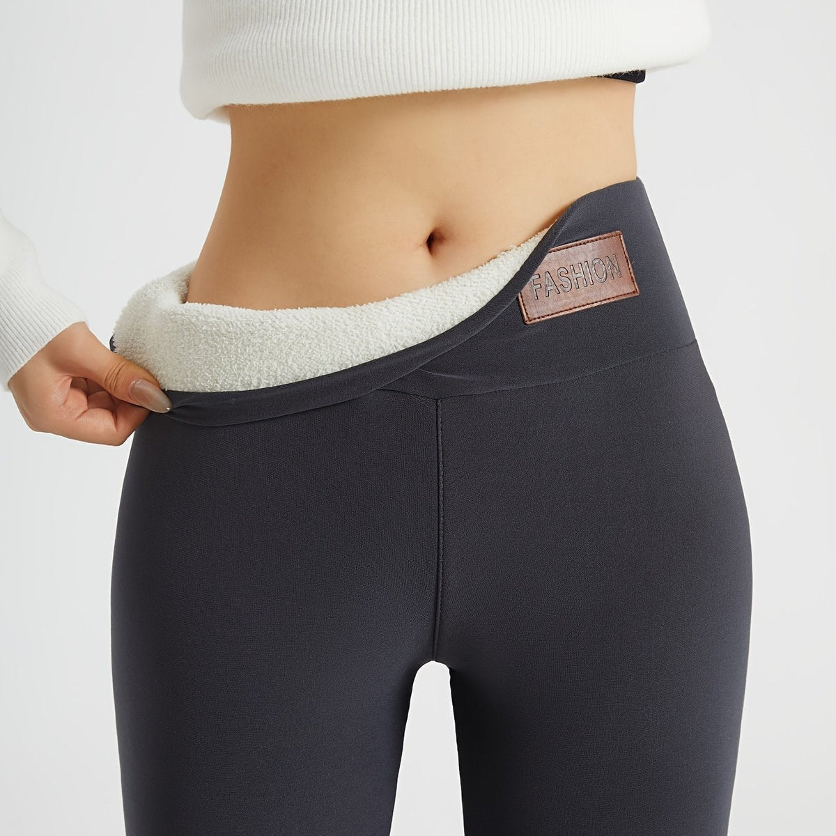 Womens fleece lined leggings in Dark Gray, high waist folded to show the plush lining